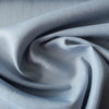 Fine weave Pewter 100% linen fabric with smooth finish and soft drape, suitable for elegant tops, skirts, dresses, and lightweight jackets.