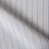 Yarn-dyed striped linen fabric in earth and sky tones, perfect for creating elegant and comfortable apparel.