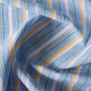 Vibrant Summer Beach Stripe linen fabric with chambray blues and summertime yellow stripes, ideal for fresh and classic summer garments.