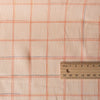 Subtle check Peach Puff 100% linen fabric with variegated thread, ideal for creating elegant and versatile garments