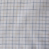 Rustic light check linen fabric with oatmeal and royal blue stripes on white background