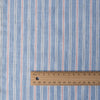 Classic Country Blue Stripe Linen Fabric with thicker cornflower blue and thinner white stripes, complemented by light red and dark blue hairline stripes.