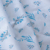 Lightweight-medium weight Blue Botanical Breeze linen fabric with subtle plaid weave and blue floral prints