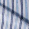Lightweight Summertime Blues linen fabric with alternating blue stripes, ideal for creating elegant and breezy summer apparel.