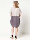 back view of women wearing linen eme dress made using Eme Dress sewing pattern by Style Arc, featuring a loose-fitting cocoon shape, perfect for summer, and suitable for linen, rayon, silk, cotton, and fine wool fabrics.