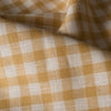 Honey yellow and white woven checks on lightweight Honey Gingham 100% Linen Fabric, with a smooth hand and subtle slubs