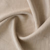 image  of Sandstone Herringbone Linen fabric with a classic herringbone weave, showing its heavy texture and warm, earthy tones suitable for sewing garments and home textiles.