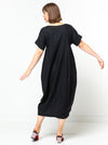 Contemporary Sydney Designer Dress sewing pattern featuring a full cocoon shape, high-low hemline, and engineered panels for an elegant drape, ideal for various fabrics