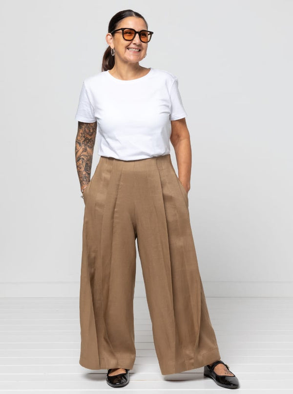 Atlas Woven Pant Sewing Pattern - wide leg crop pants with fitted waist, invisible zip, side inseam pockets, twisted pleat detail, and slight dropped crotch.