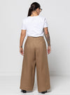 Atlas Woven Pant Sewing Pattern - wide leg crop pants with fitted waist, invisible zip, side inseam pockets, twisted pleat detail, and slight dropped crotch.