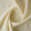 Cream 100% linen fabric in cream color, light-medium weight, perfect for sewing garments.