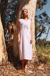 lady wearing white dress made using Fawn Dress Set Sewing Pattern - Versatile Dresses with Pockets in Two Bodice Styles