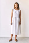 lady wearing white dress made using Fawn Dress Set Sewing Pattern - Versatile Dresses with Pockets in Two Bodice Styles