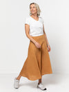 Haven Woven Skirt Sewing Pattern - mid-length skirt with fitted waist, invisible zip, flared hem with curved seams, and shaped waistband.