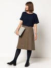 front view of Mary-Ann A-Line Skirt Sewing Pattern by Style Arc featuring a 4-panel design, slant pockets, and invisible zip, made with woven fabrics like linen or cotton