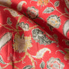 Oriental Flower Linen Print on 100% linen fabric, featuring a red background with a multicolored floral pattern