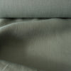 Soft Moss 100% Linen Fabric with a fine close weave and subtle slubs, exuding a smooth touch and elegant drape