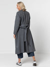 Stella Woven Coat Sewing Pattern - mid-length wrap coat with long sleeves, tie belt, revere and stand collar, fully lined, panelled back with yoke, in-seam pockets, and back vent