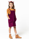 Style Arc’s Zoe Kids Pinafore pattern with button-through front and adjustable shoulder straps.