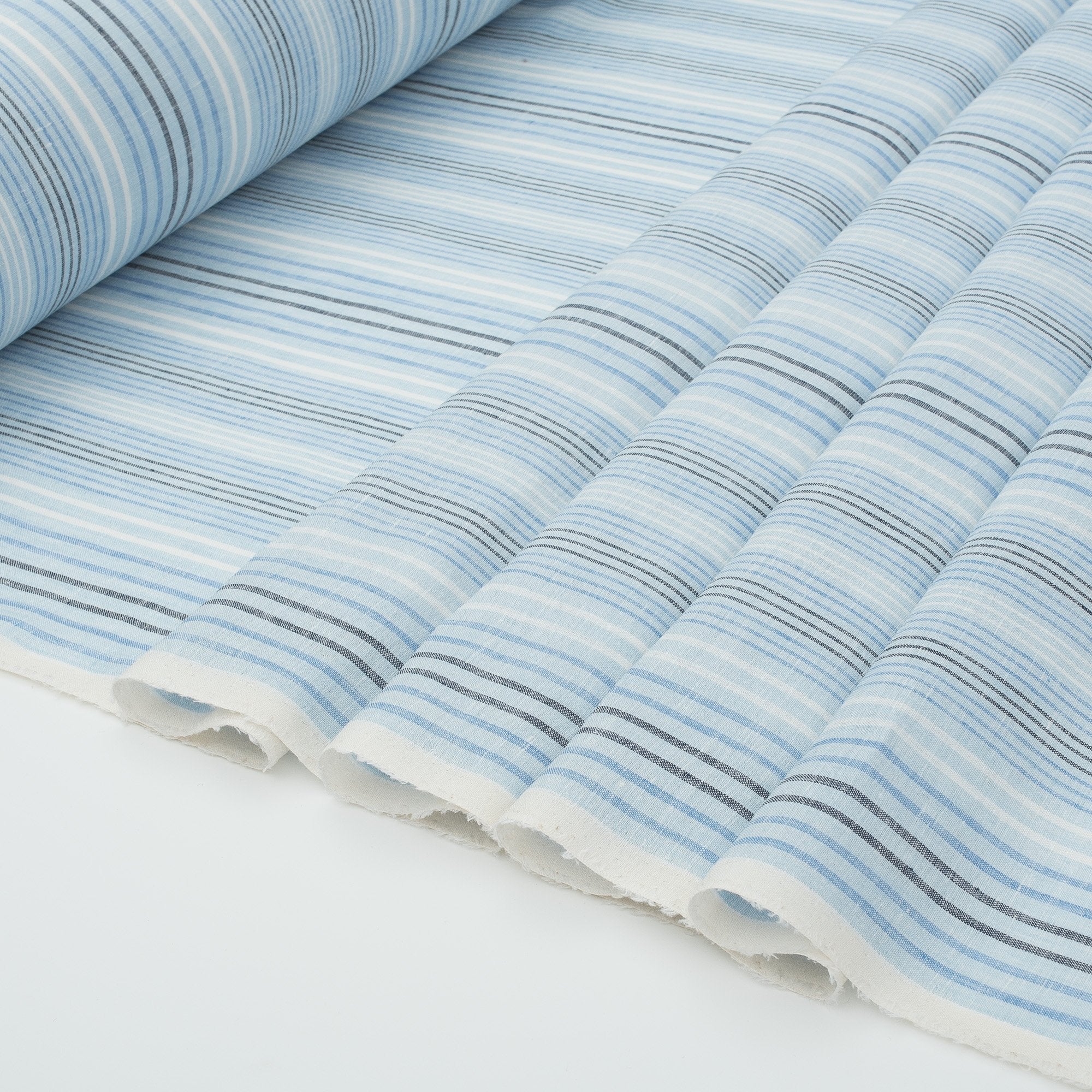 https://www.delinum.com.au/cdn/shop/products/Blue-Multi-Stripe-100-Linen-Fabric-Pure-Linen-Fabric-2.jpg?v=1657609938